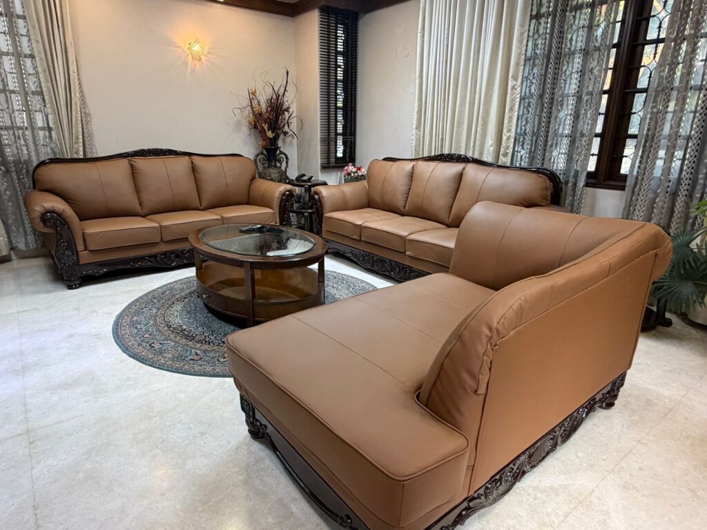 Custom-made pure leather sofa set with premium finish crafted by Shanthi Sofa Works in Bangalore